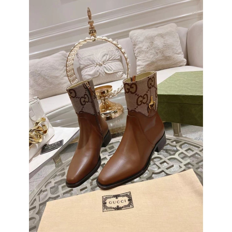 G*u*i boots